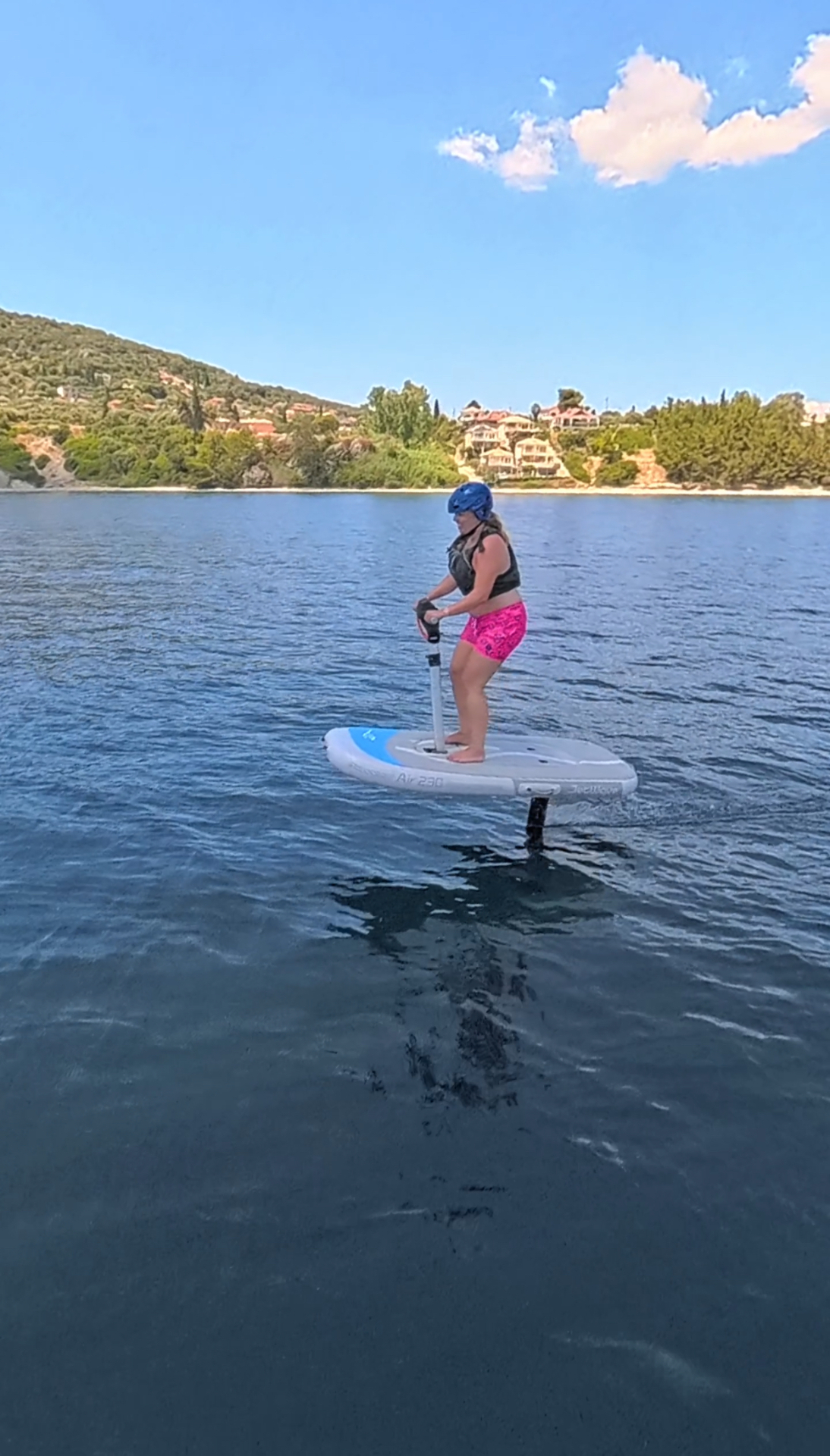 Rider learning to lift on the e-foil above the water